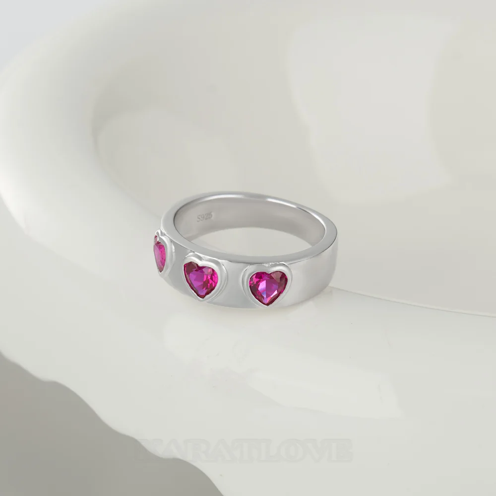 Three Heart Cut Ruby Red Sterling Silver Bezel Promise Ring