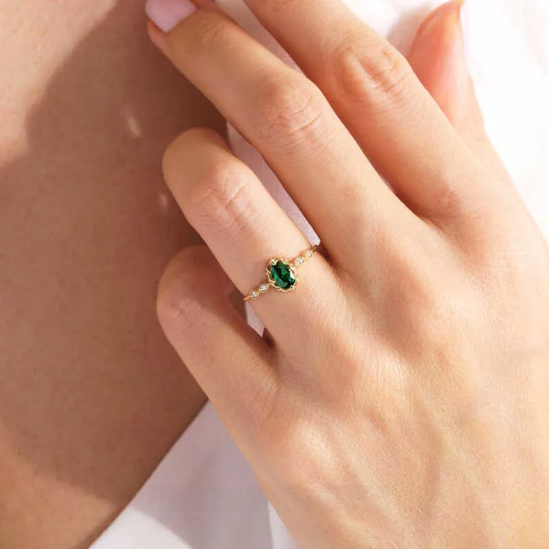 Oval Cut Emerald Green Sterling Silver Yellow Gold Engagement Ring