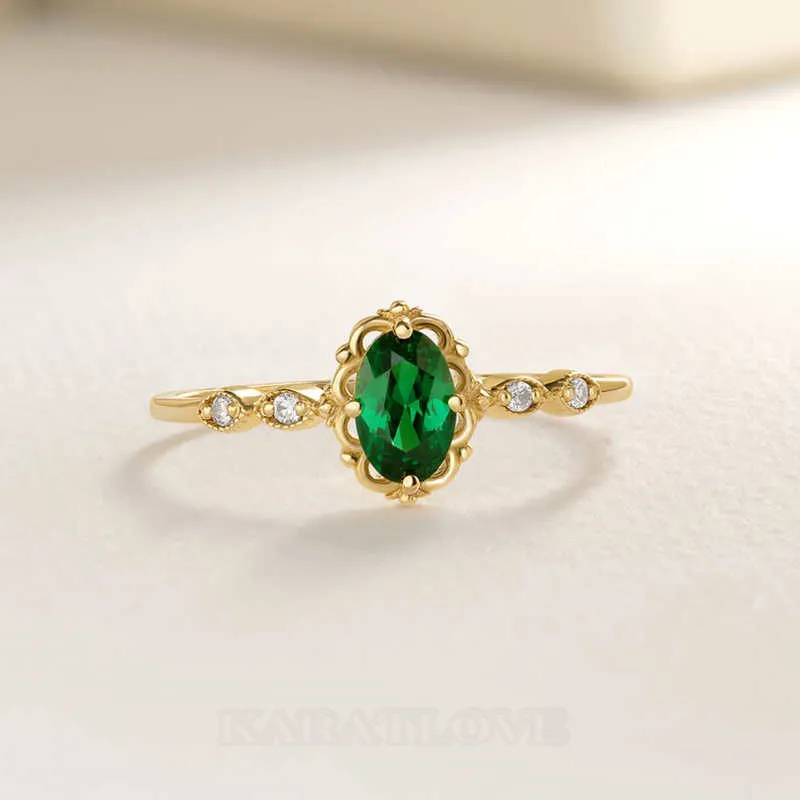 Oval Cut Emerald Green Sterling Silver Yellow Gold Engagement Ring