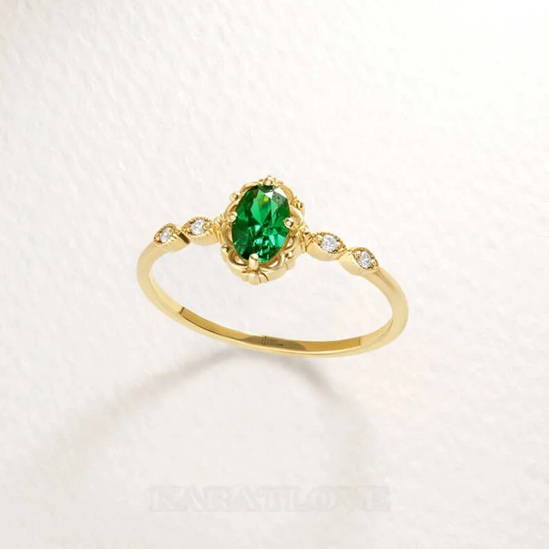 Oval Cut Emerald Green Sterling Silver Yellow Gold Engagement Ring