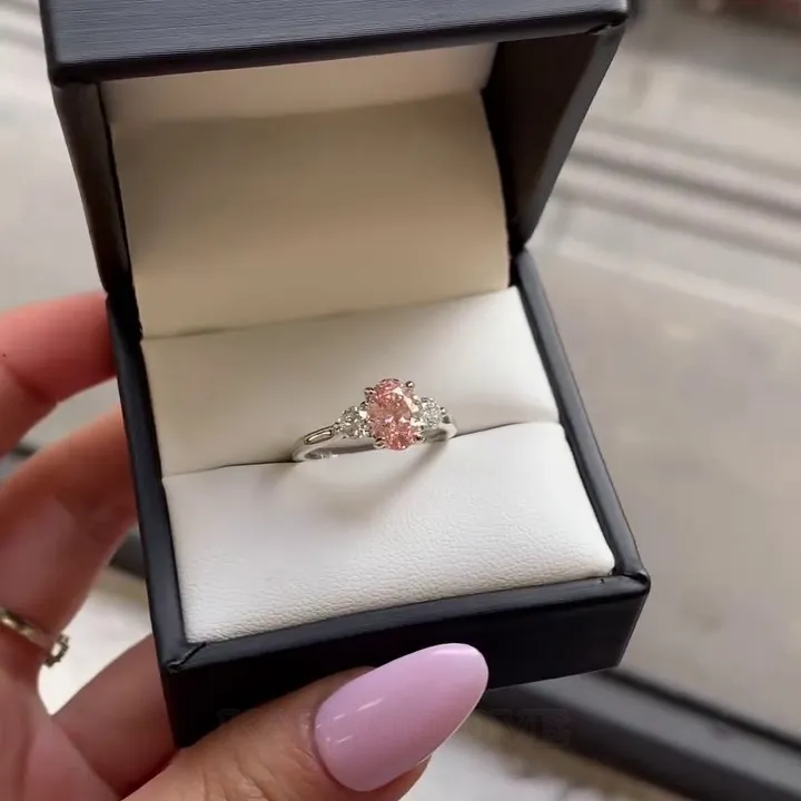 Oval Cut Fancy Pink Sterling Silver 3-Stone Engagement Ring Oval Cut Fancy Pink Sterling Silver 3-Stone Engagement Ring