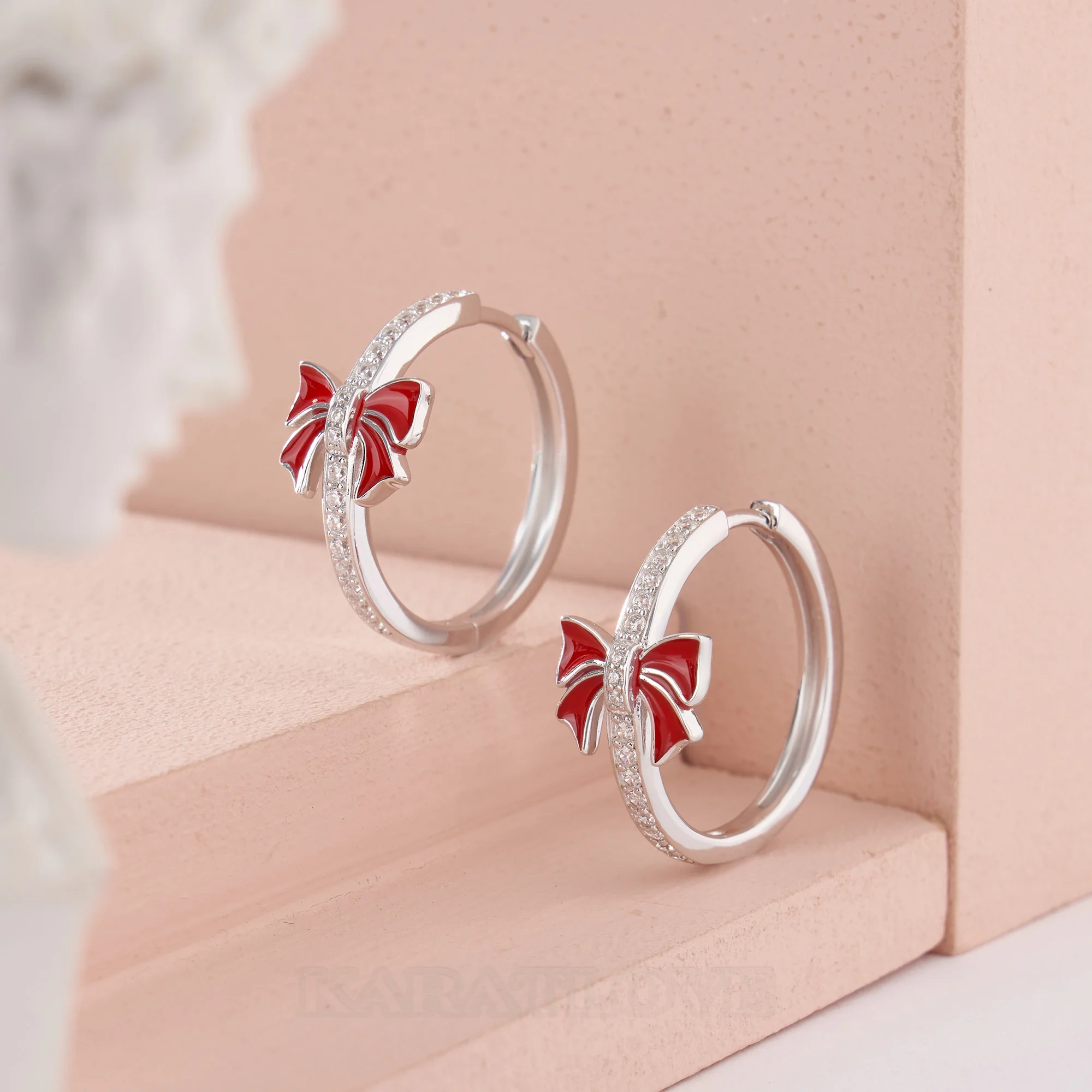 Round Cut Diamond White Sterling Silver Hoop Earrings with Red Bow