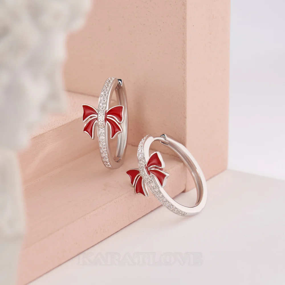 Round Cut Diamond White Sterling Silver Hoop Earrings with Red Bow