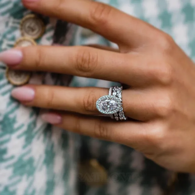 Oval Cut Diamond White Halo 3-Piece 925 Sterling Silver Ring Set Oval Cut Diamond White Halo 3-Piece 925 Sterling Silver Ring Set
