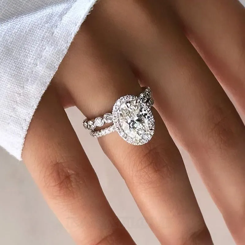 Oval Cut Diamond White Sterling Silver Halo Ring Set