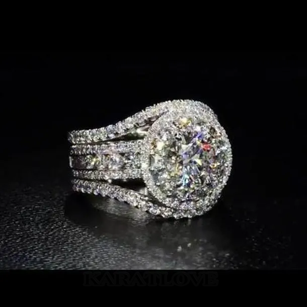 Diamond White Round Cut Halo Engagement Ring in Sterling Silver