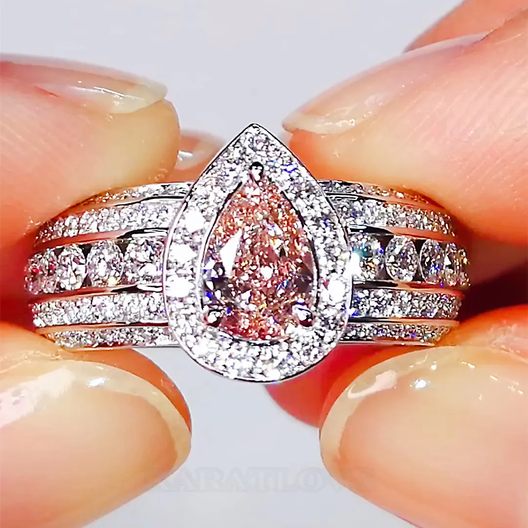 Fancy Pink Pear Cut Halo Engagement Ring in 925 Sterling Silver Fancy Pink Pear Cut Halo Engagement Ring in 925 Sterling Silver
