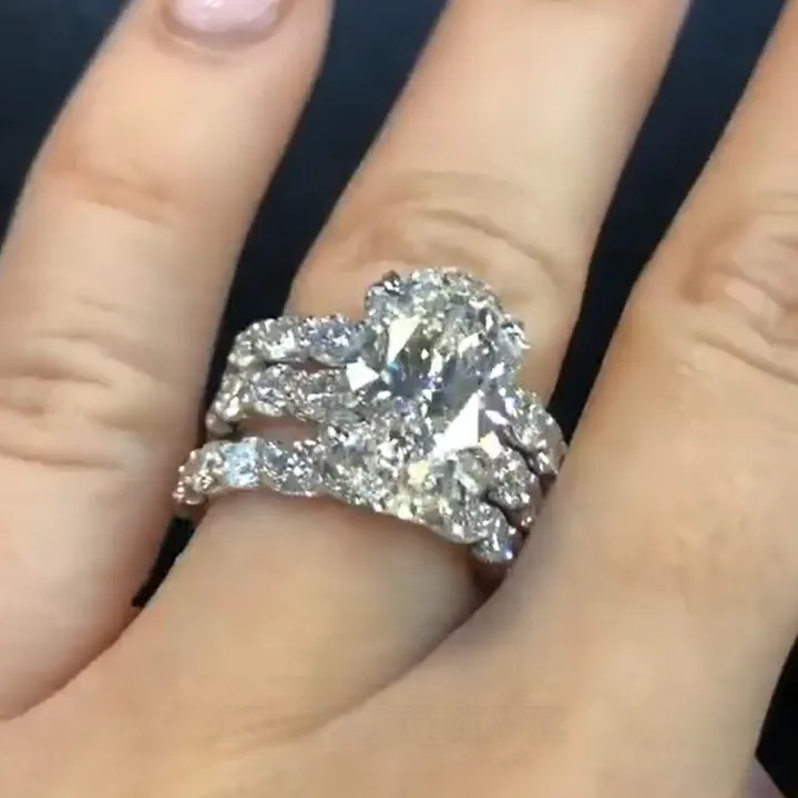 Sterling Silver Oval Cut Diamond White 3-Piece Bridal Sets
