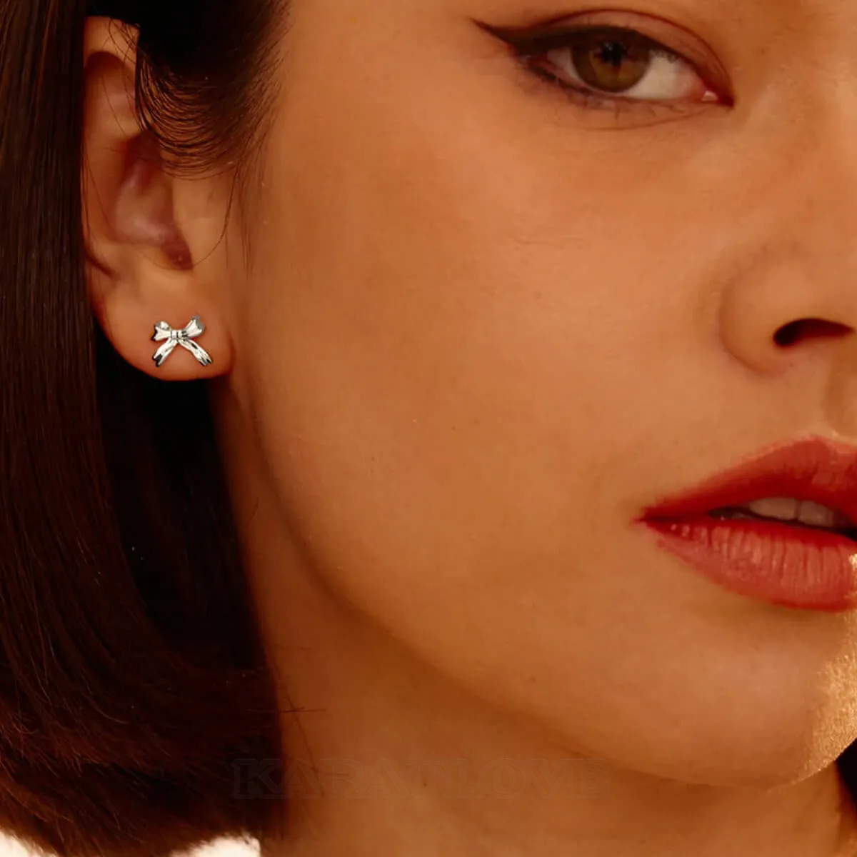 Platinum Plated Ribbon Stud Earrings