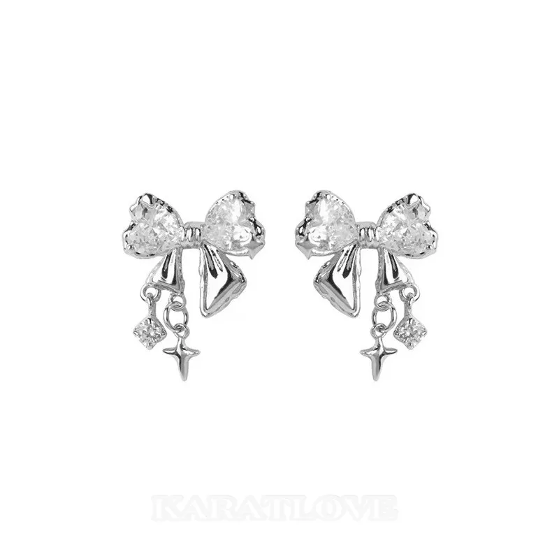 Platinum Plated 925 Sterling Silver Bow Stud Earrings Platinum Plated 925 Sterling Silver Bow Stud Earrings