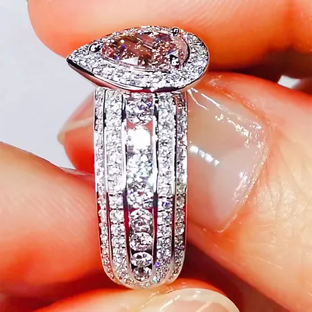 Fancy Pink Pear Cut Halo...