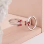 Round Cut Diamond White Sterling Silver Hoop Earrings with Red Bow