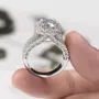 Round Cut Diamond White Halo Engagement Ring in Sterling Silver