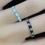 Black and White Iris Sterling Silver Couple Rings